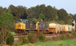 CSX 7335 leads train F707-30 past the signals early in the morning